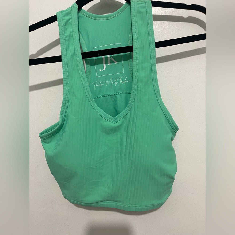 set of 2 sport Bras 1 Mint green and 1 orange Racerback Sports Bra. Sz S/M